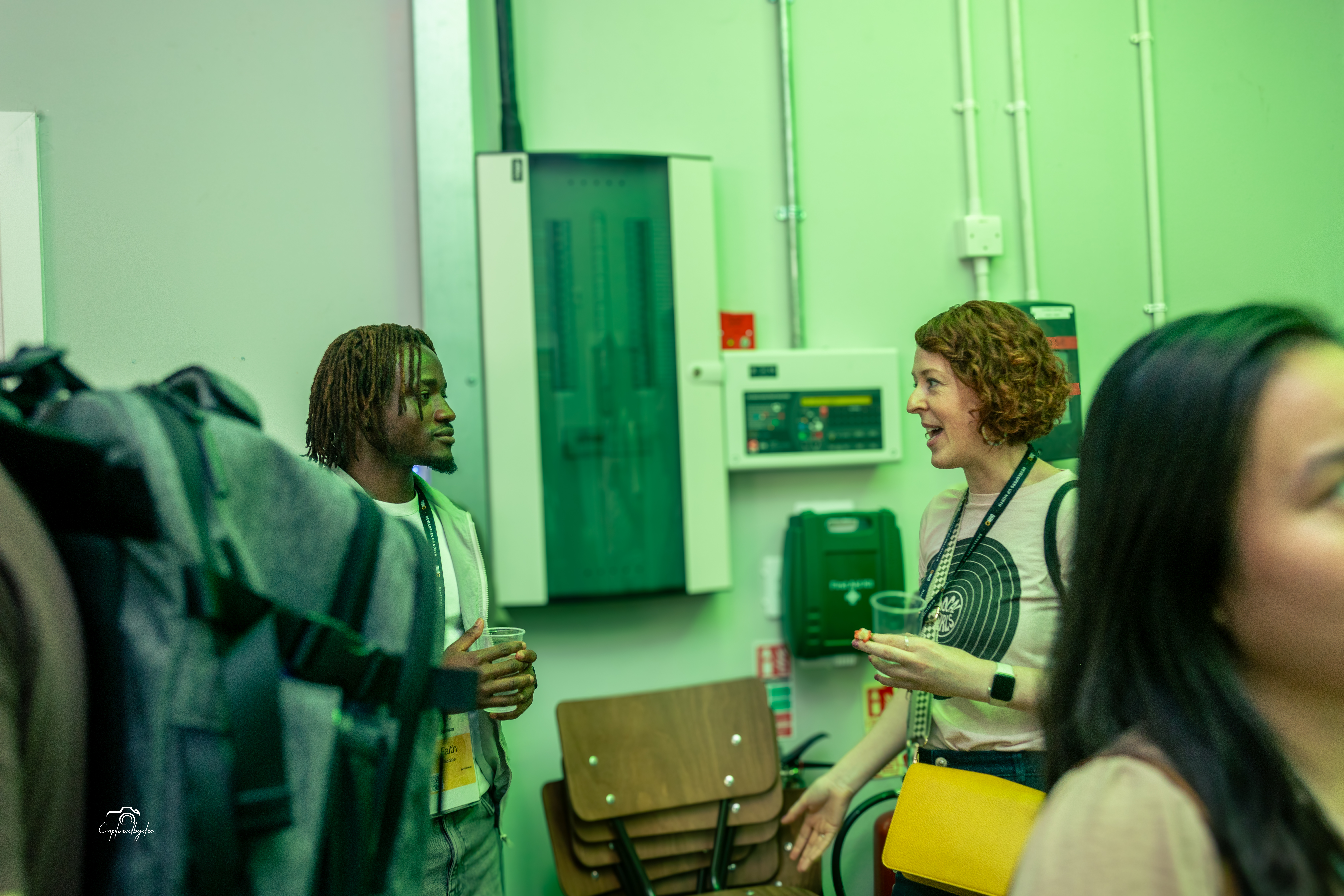 Faith Sodipe with attendees after the talk